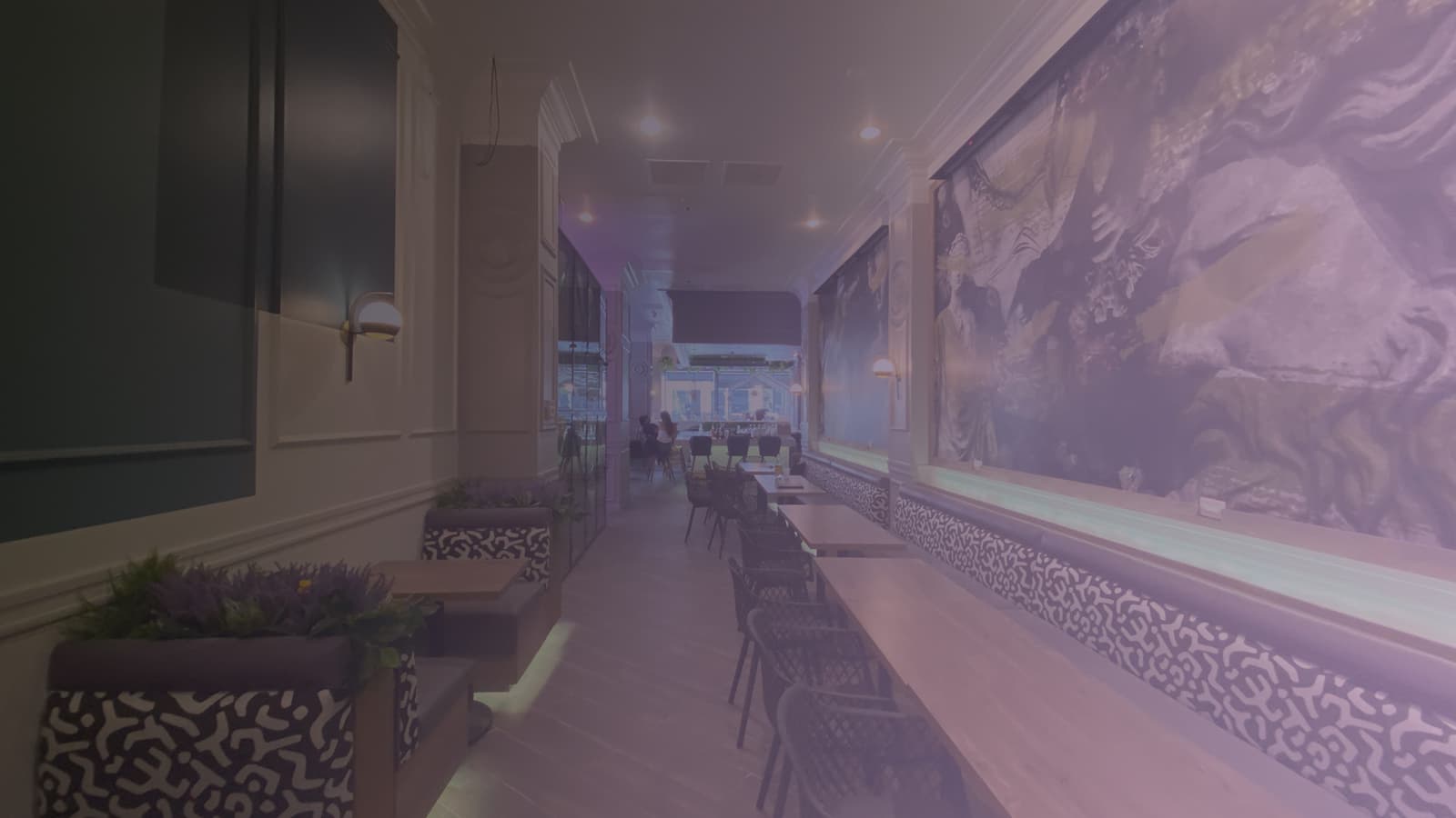 The Medusa Room lounge with leopard banquettes and a Greek mural