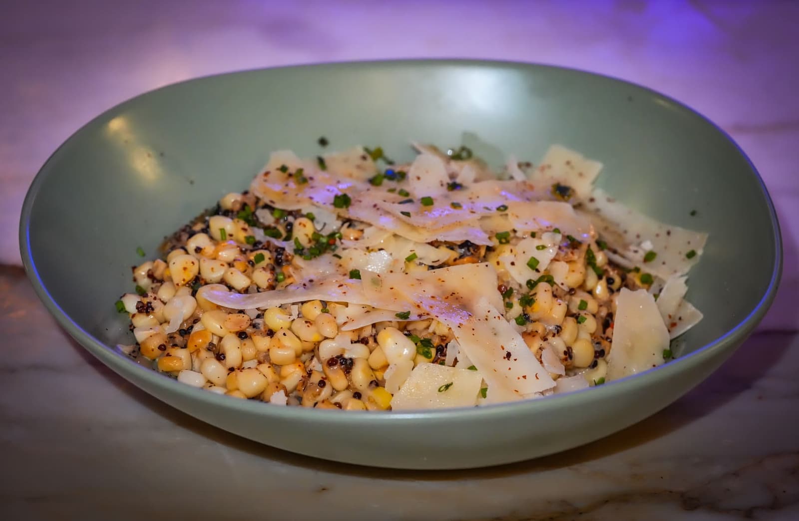 Truffle corn bowl with shaved pecorino served during Salvatore's happy hour in downtown San Diego